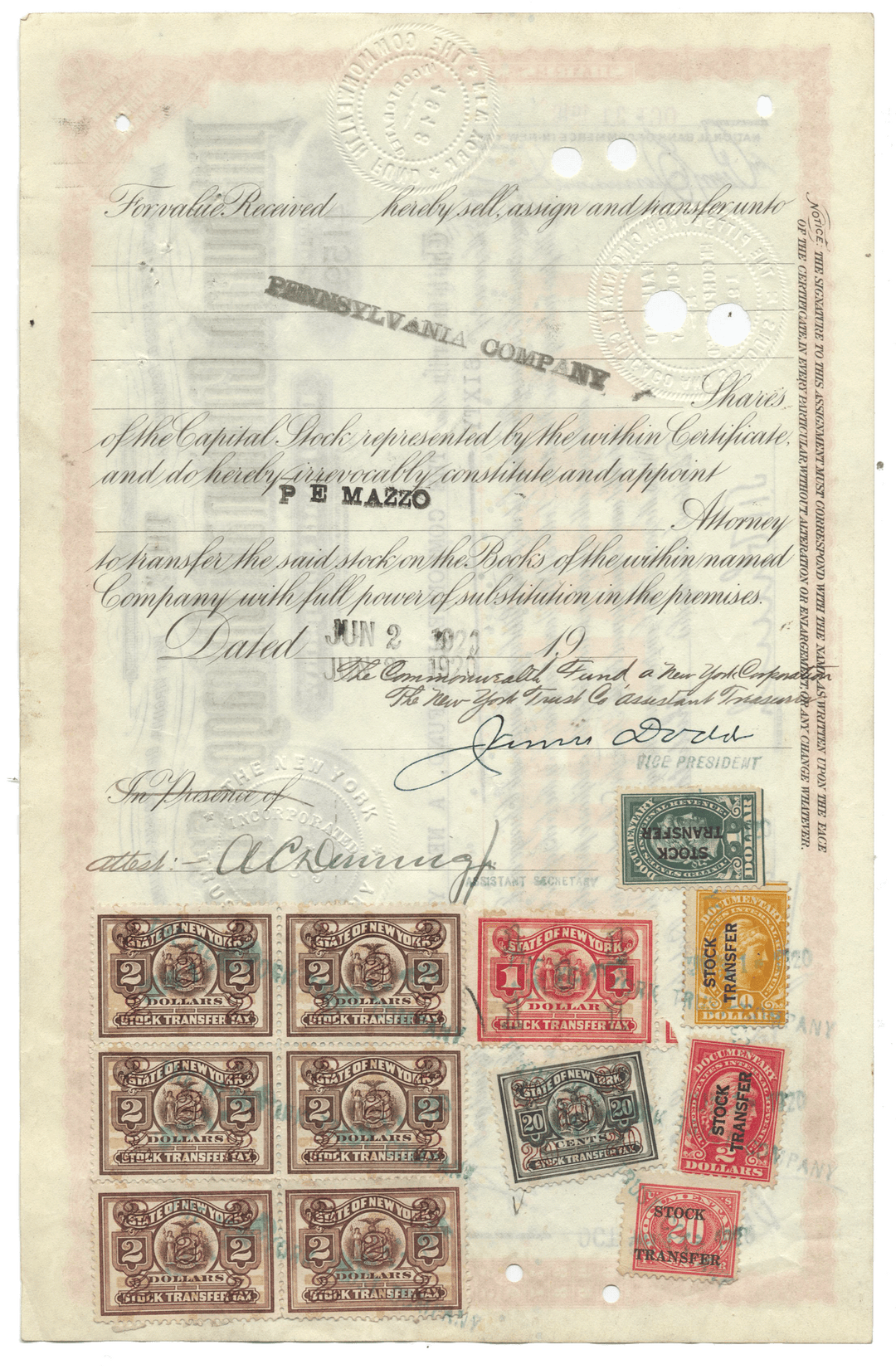 An antique stock certificate for the Pittsburgh, Cincinnati, Chicago and St. Louis Railroad Company from 1918 featuring revenue stamps on the verso