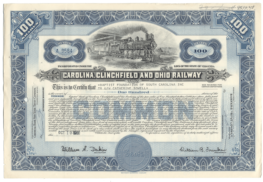 Vintage stock certificate for Carolina Clinchfield and Ohio Railway with a train illustration.