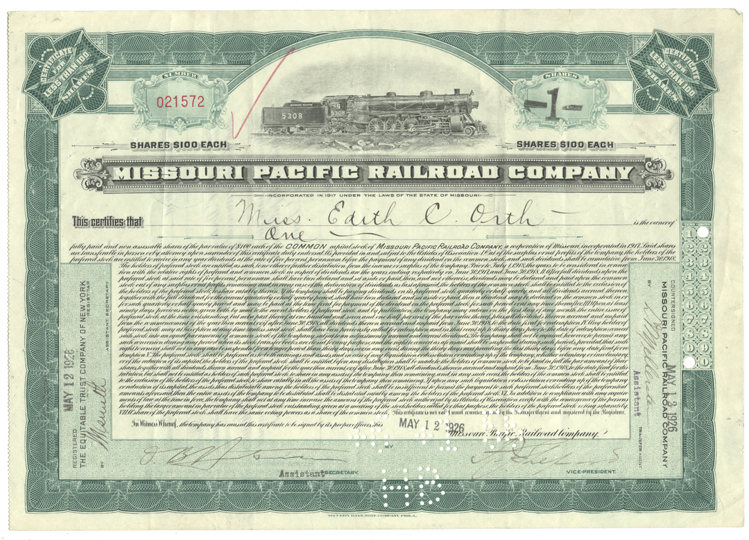 Share certificate of the Missouri Pacific Railroad Company with a train illustration on a green background.
