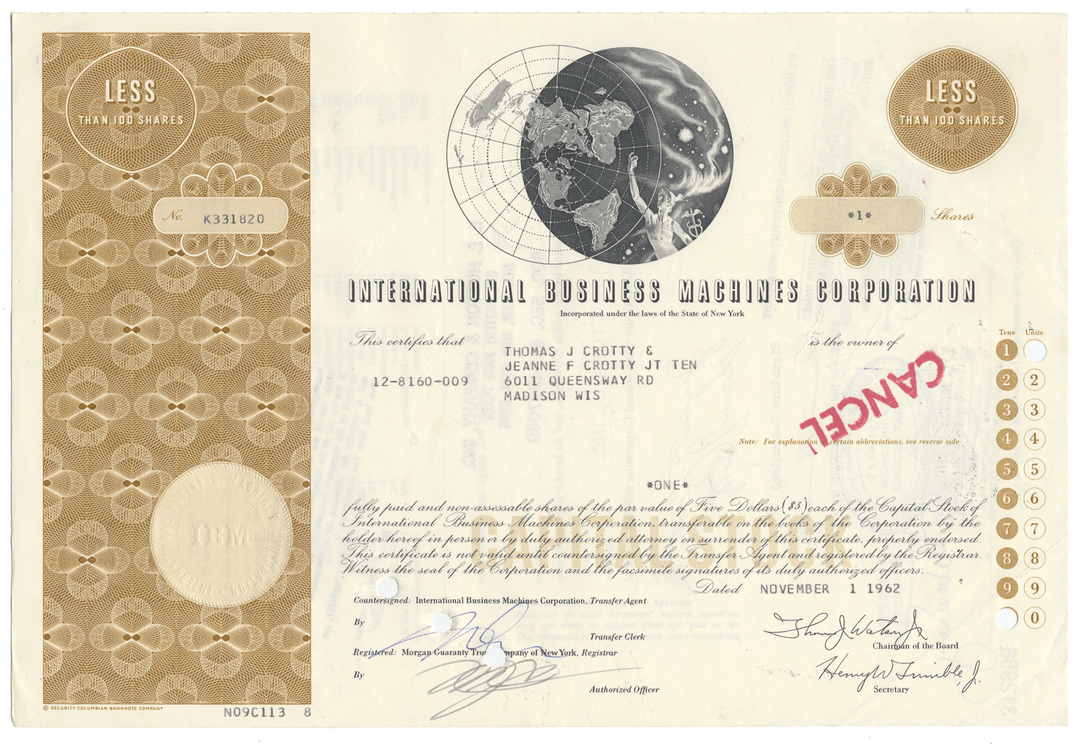 Vintage International Business Machines Corporation (IBM) stock certificate with decorative elements and text.