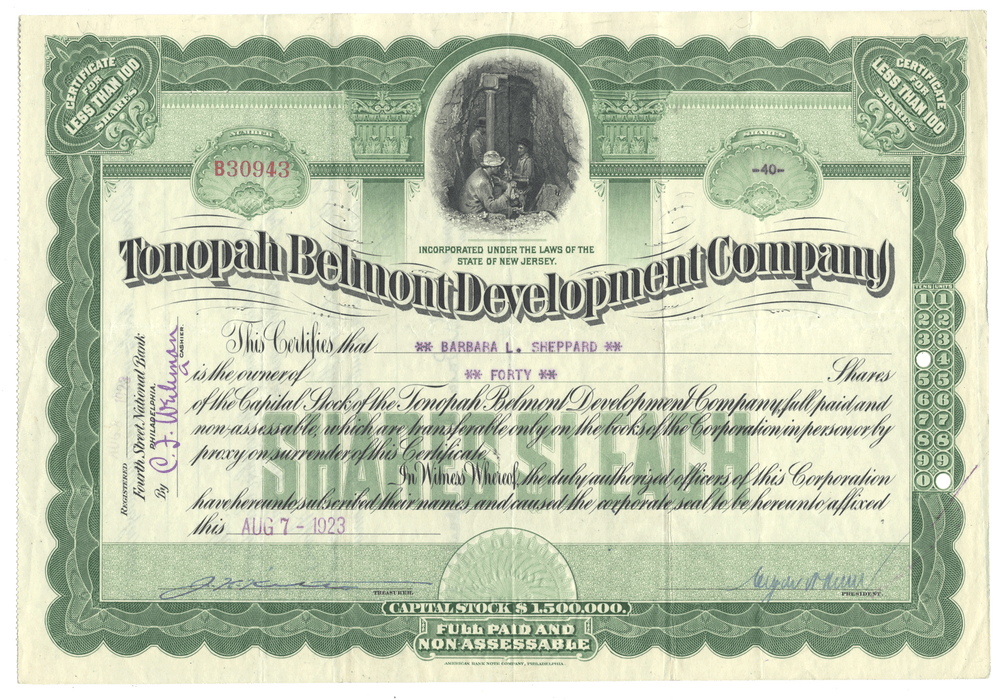 Vintage stock certificate for Tonopah Belmont Development Company with green and white design.