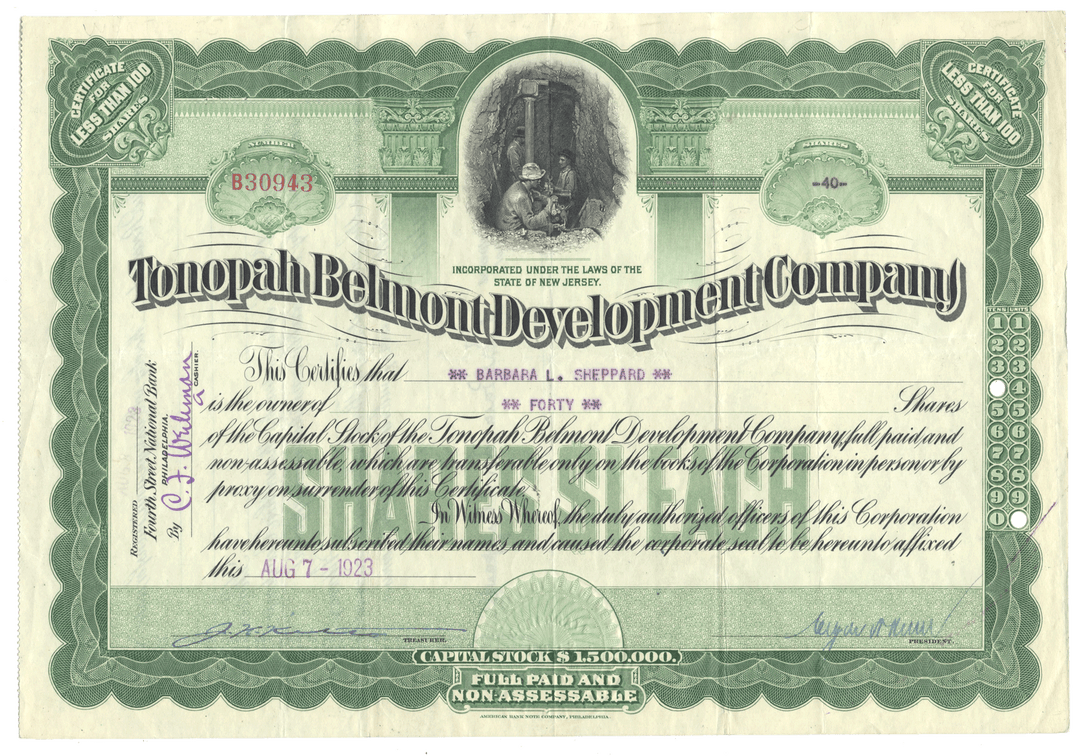 Vintage stock certificate for Tonopah Belmont Development Company with green and white design.