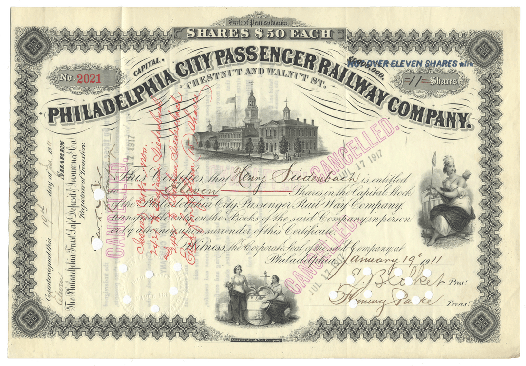 Historical stock certificate of the Philadelphia City Passenger Railway Company with architectural illustration and text.