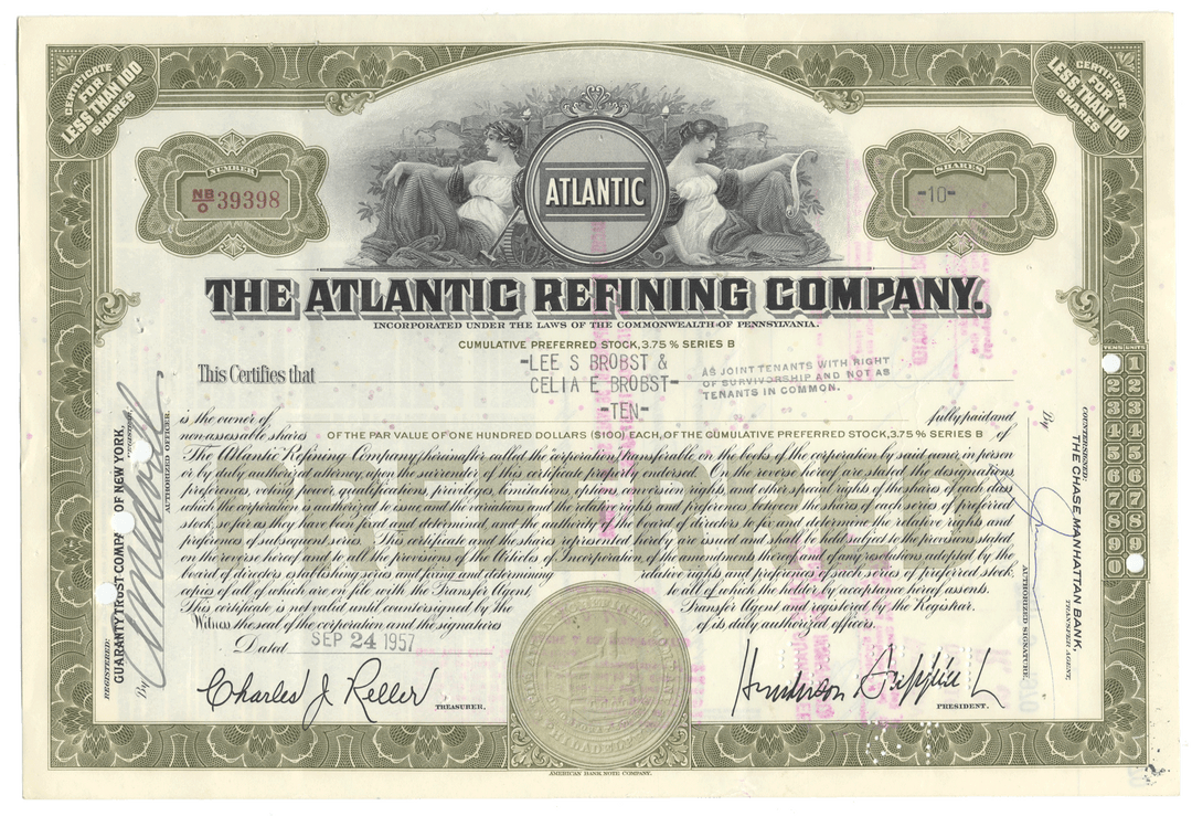 Share certificate of The Atlantic Refining Company with decorative elements and text.