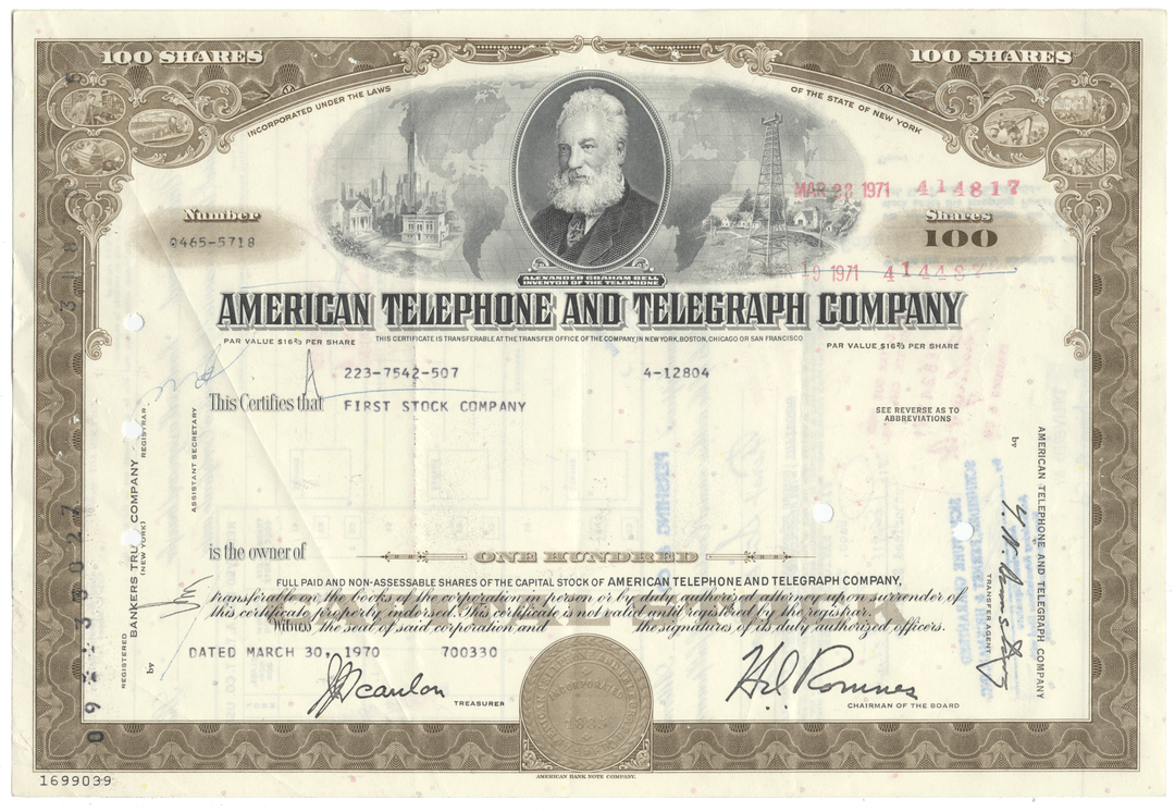 Vintage stock certificate of American Telephone and Telegraph Company with a portrait and text.