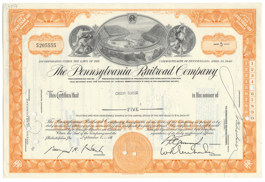 Historical stock certificate of the Pennsylvania Railroad Company with decorative elements and text.