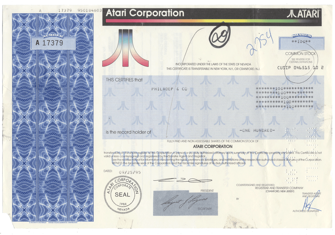 Atari Corporation stock certificate with blue and white design