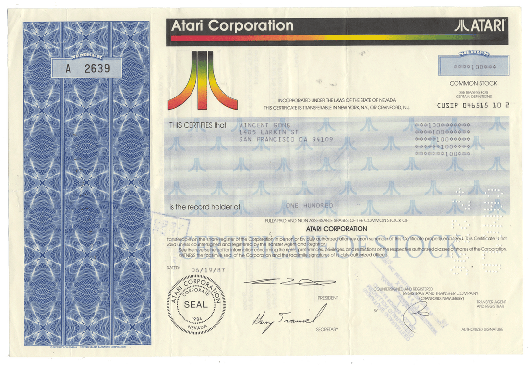 Atari Corporation stock certificate with blue and white design