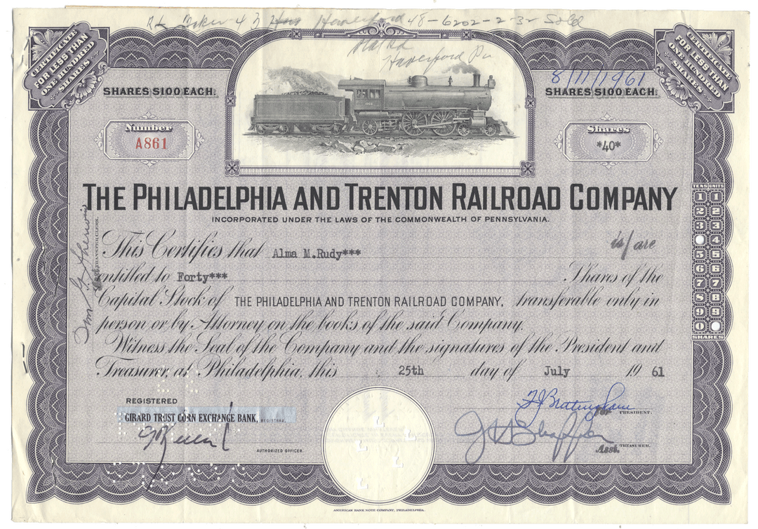 Historical stock certificate of the Philadelphia and Trenton Railroad Company with a steam locomotive illustration from 1961
