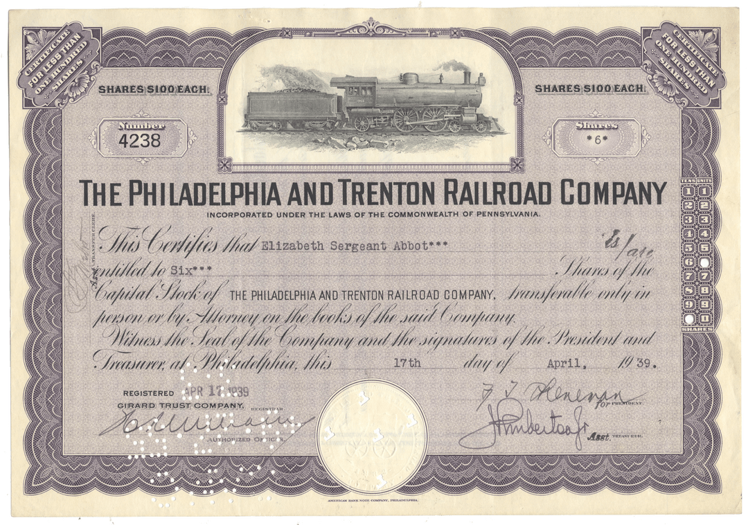Stock certificate of the Philadelphia and Trenton Railroad Company with a steam locomotive illustration.