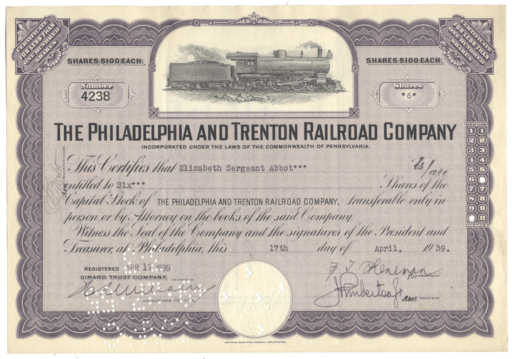 Stock certificate of the Philadelphia and Trenton Railroad Company with a steam locomotive illustration.