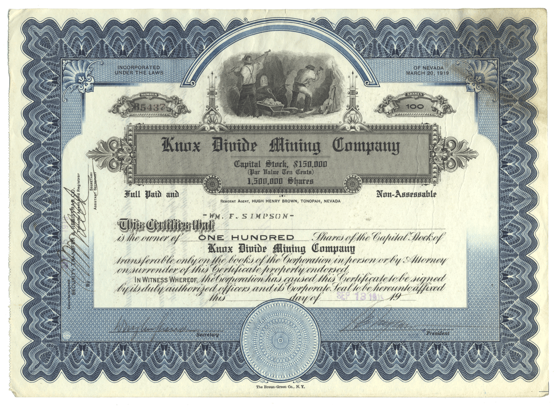 Vintage stock certificate for the Knox Divide Mining Company with decorative elements.