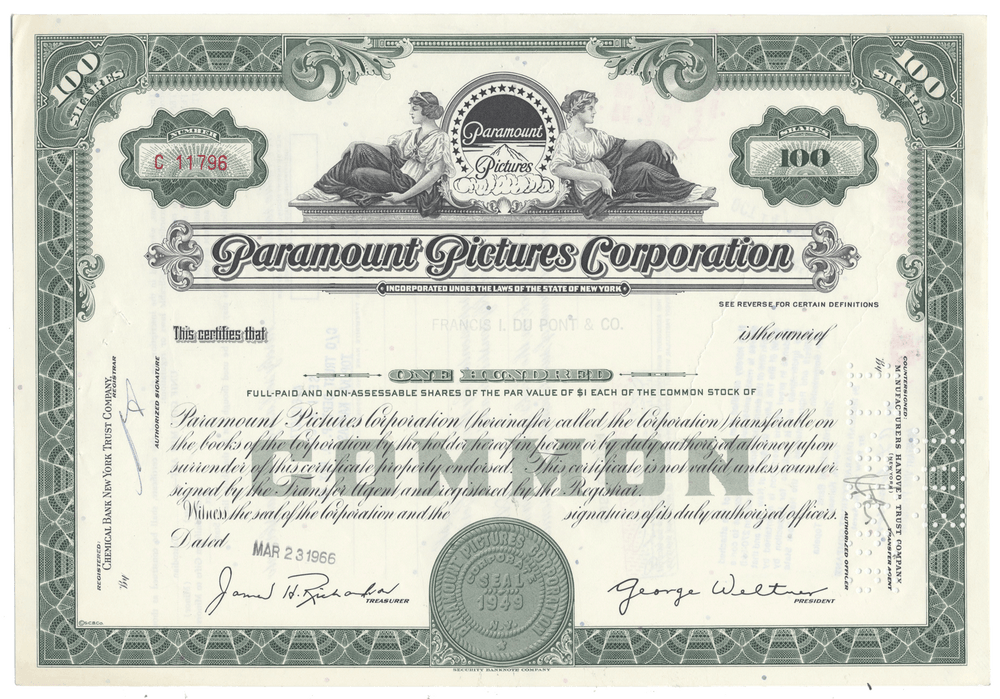 Vintage stock certificate of Paramount Pictures Corporation with decorative elements.